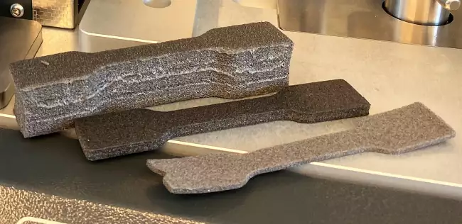 tensor tester thickness meter: Specimen thickness measurement: the Mitutoyo comparator with support for foam product measurement.