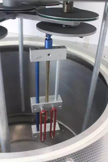 ozone cabinet static test: Ozone-Check Ozonometer: detail of inserting the sample holder into the test chamber.
